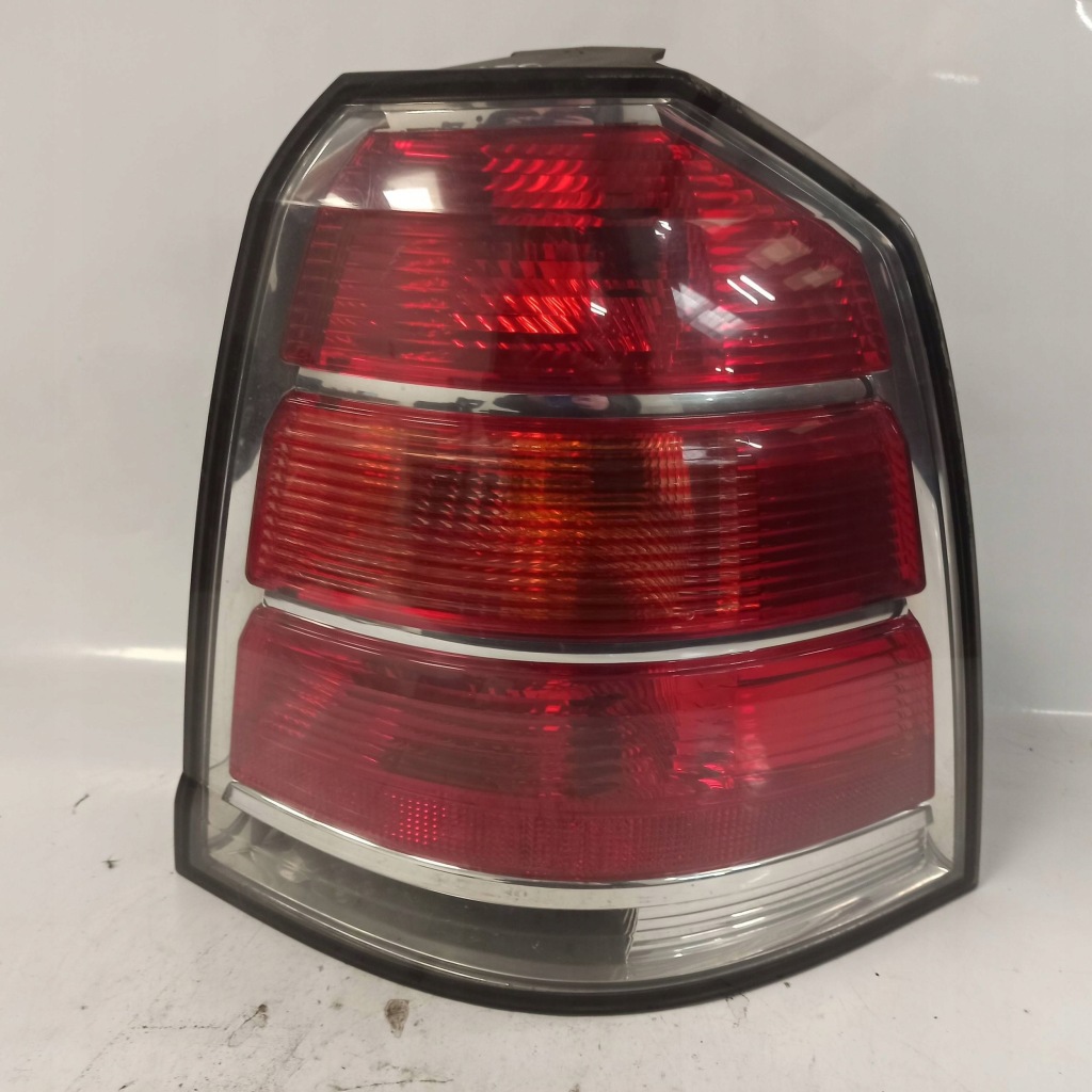 Купить Opel zafira b фара правая  задний оригинал 24451843