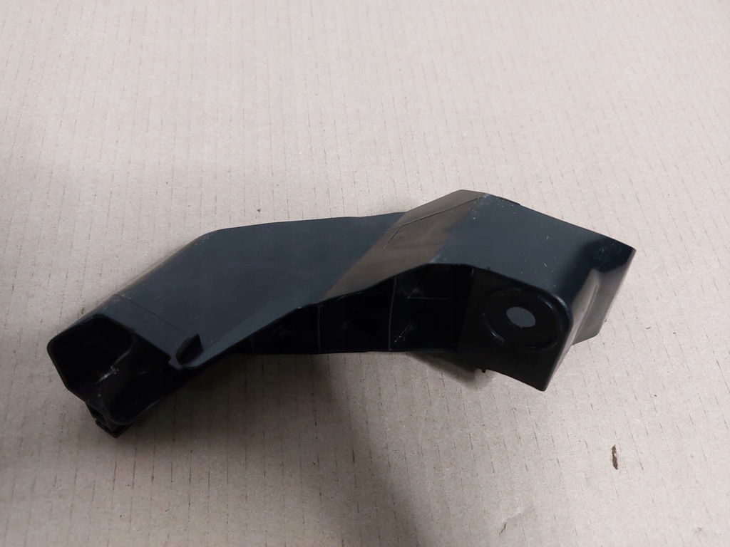 фото №1, Toyota corolla e21 xii 18- направляющая лампы задняя левый