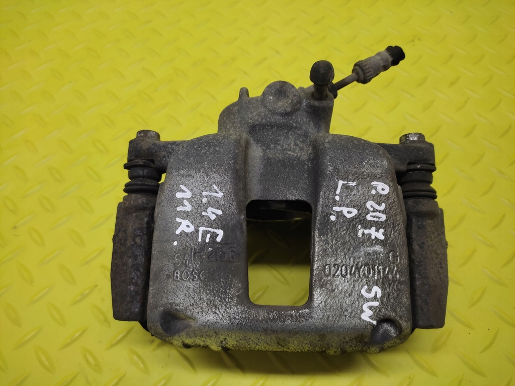 фото №1, Peugeot 207 1.4 суппорт тормозной левый перед