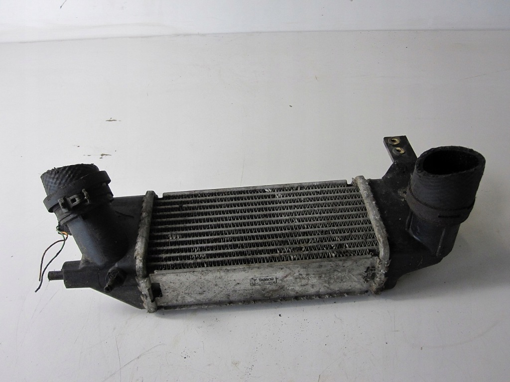 Интеркулер mazda 323f 2.0d 99r Оригинал