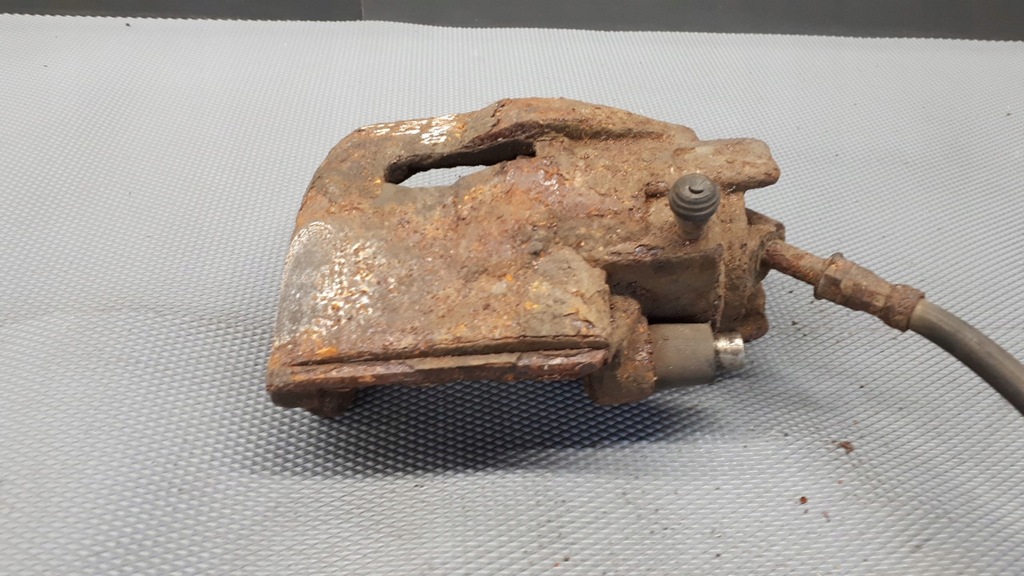 фото №10, Суппорт тормозной левый перед ford mondeo mk1