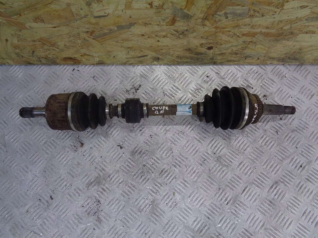 фото №1, Привідний вал ліва короткий механічна коробка передач hyundai coupe 2 ii tiburon 2001- 2.0 16v