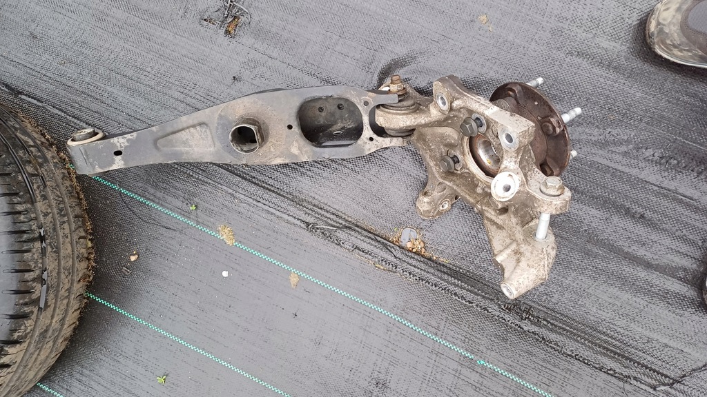 фото №1, Поворотний кулак важіль лівий задня insignia b 4x4