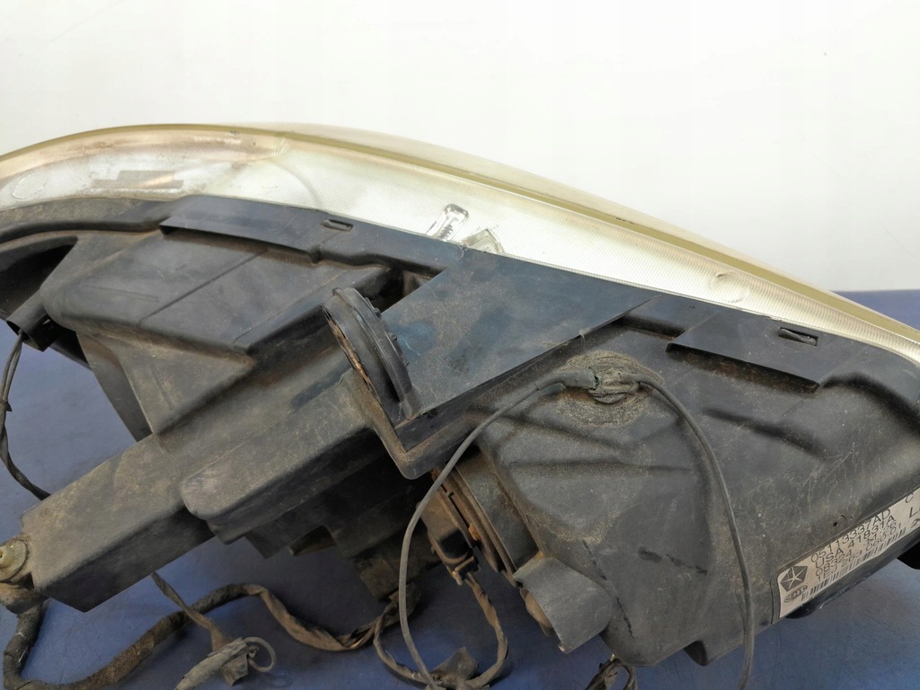 фото №5, Chrysler town country v фара левый 05113337ad