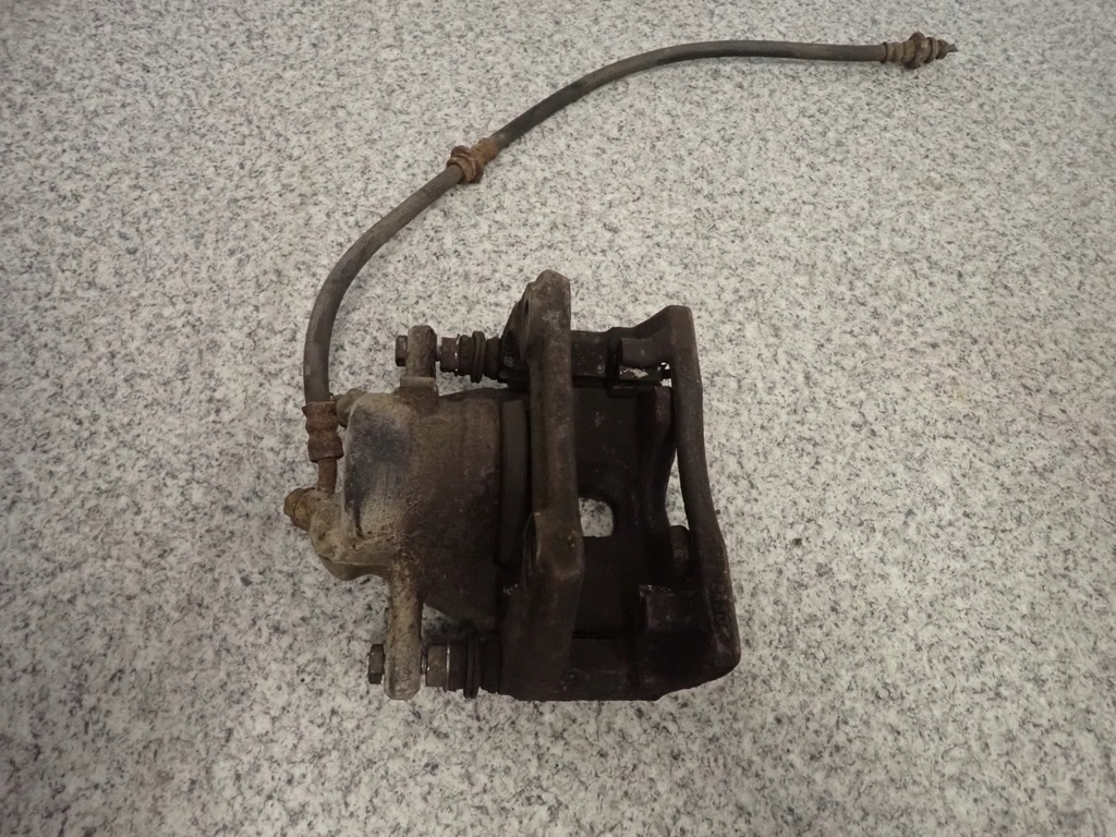 фото №4, Nissan note e11 суппорт тормозной перед правый