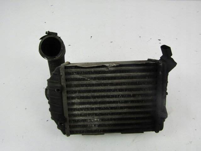 Vw passat b5 радиатор интеркулер 2,5tdi левая 059145805 Оригинал