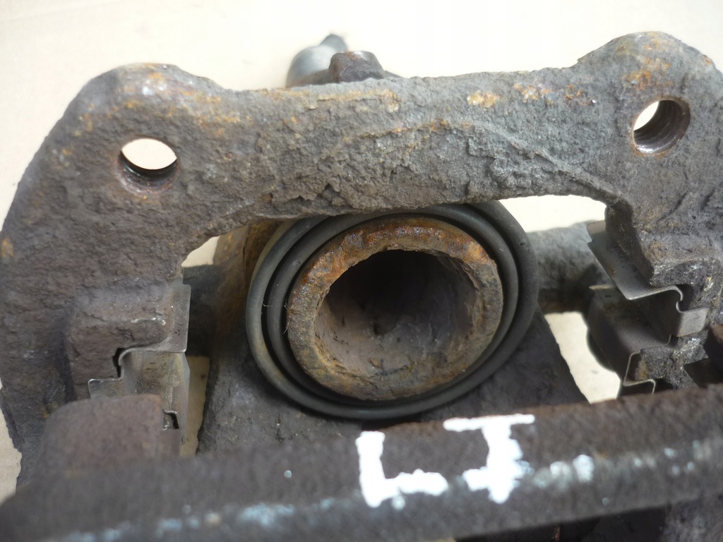 фото №10, Суппорт тормозной + скоба левый задняя bmw 1 e87 e81 280mm 40/10 проверенный