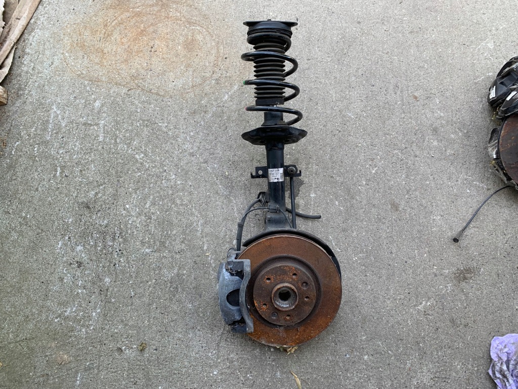 фото №1, Амортизаторна стійка поворотний кулак ліва 543034ea3 kadjar