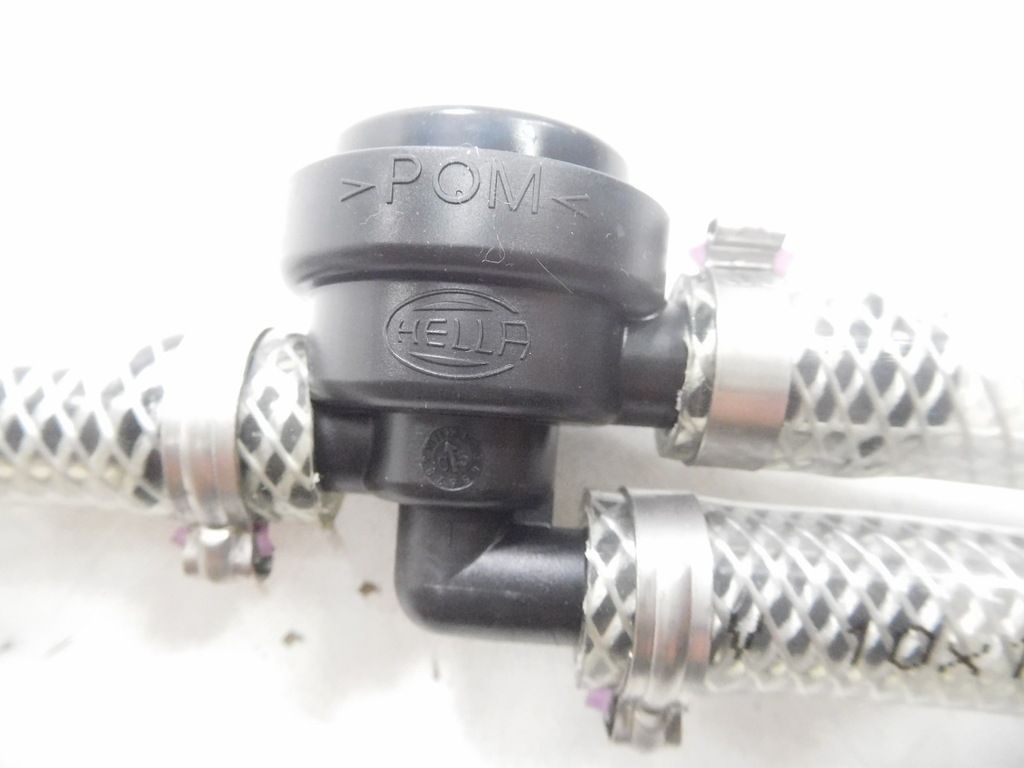 фото №11, Клапан распылителя фары перед fiat punto оригинальный номер 7773597