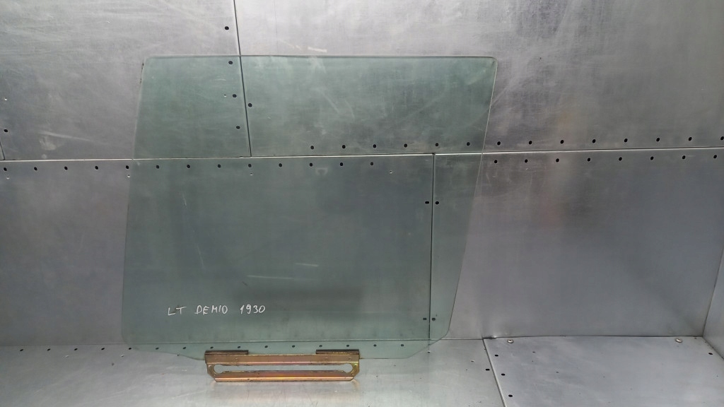 фото №1, Скло ліва задня mazda demio 03r 1.5b