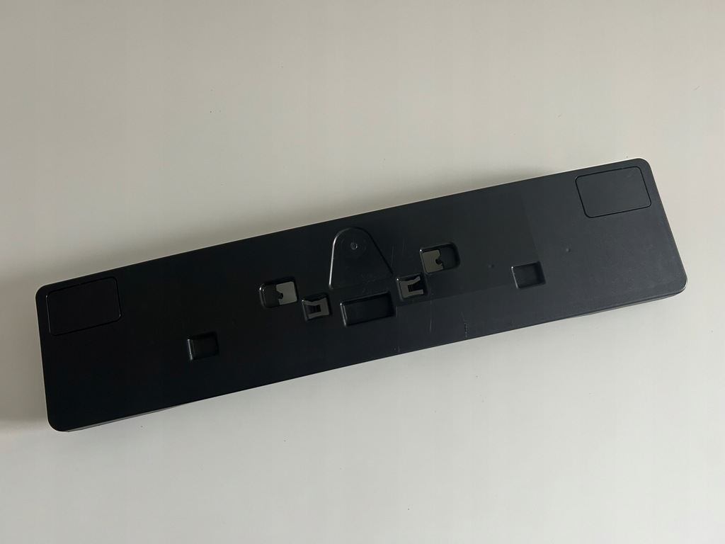 фото №1, Mazda 2 demio 4 iv lift 2023-- основание номерного знака 52x12cm dmrw оригинал