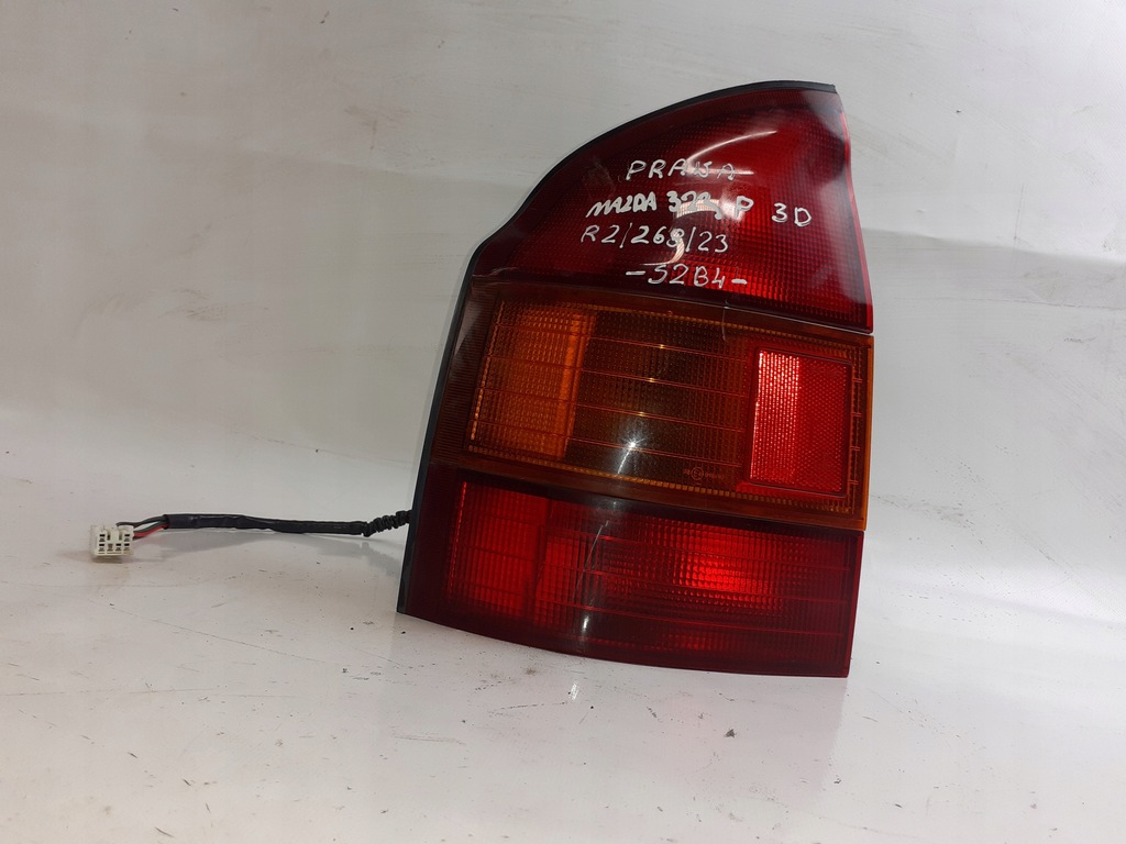 фото №5, Лампа левая задняя mazda 323p 3d