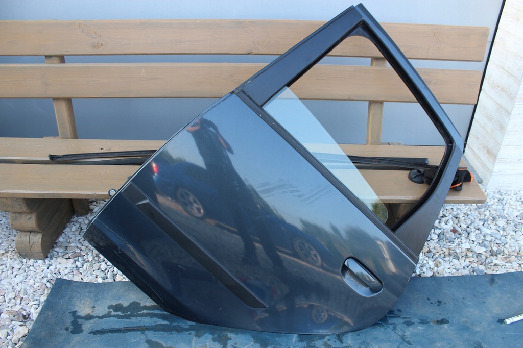 фото №1, Mitsubishi colt lift 09-. двері лівий задня 5d u05