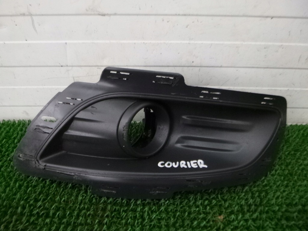 фото №1, Transit courier 14- решётка бампера левая оригинал