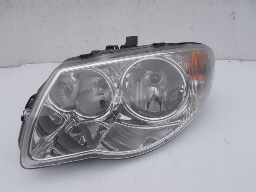 фото №1, Фара лампа chrysler voyager iv lift левый