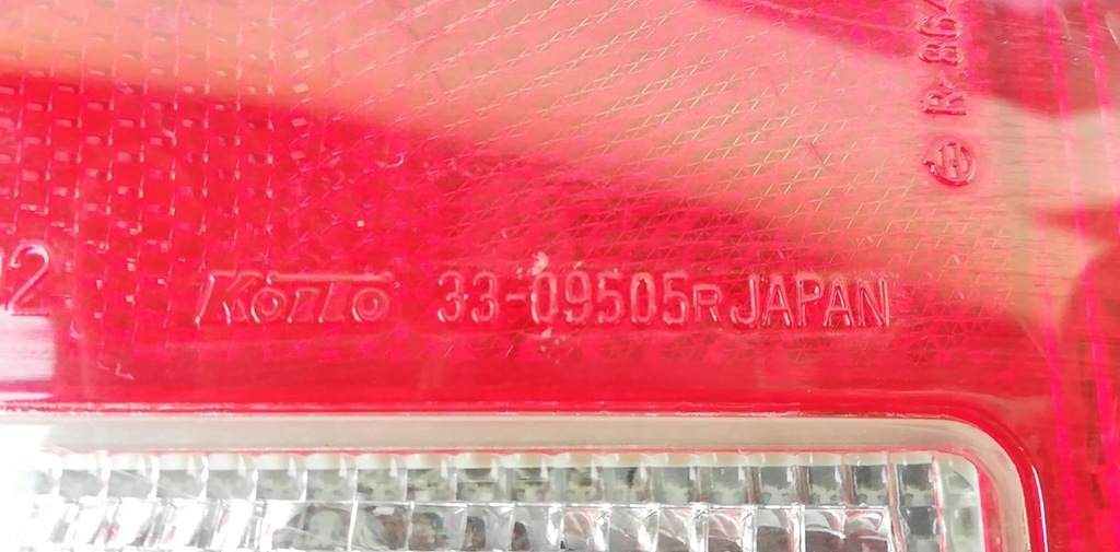 фото №7, Mazda 121 лампа права задня оригінал 33-09505