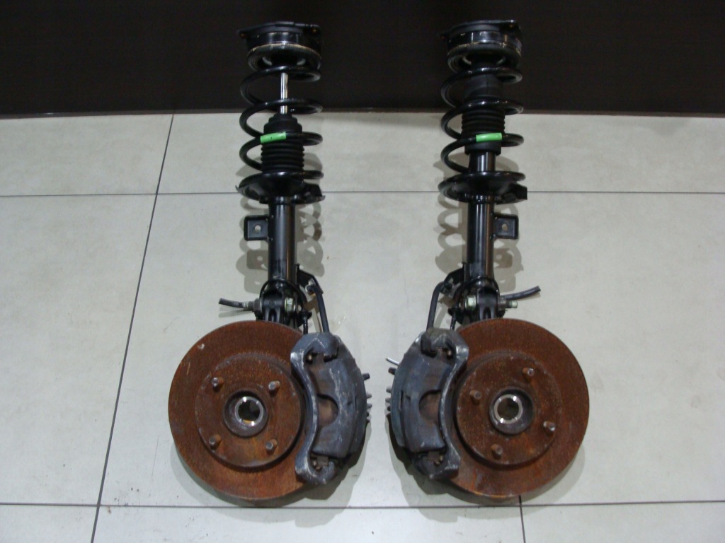 фото №1, Амортизатор поворотный кулак правая nissan nv200 lift !