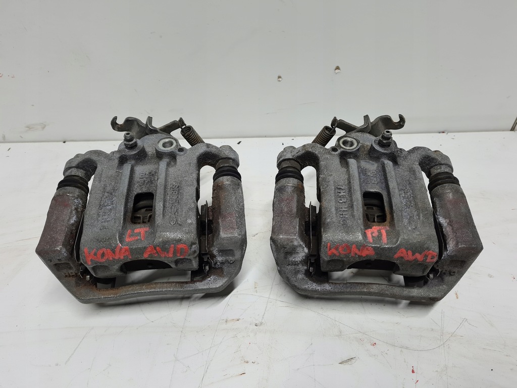 фото №1, Hyundai kona суппорт тормозной левый задняя 4x4