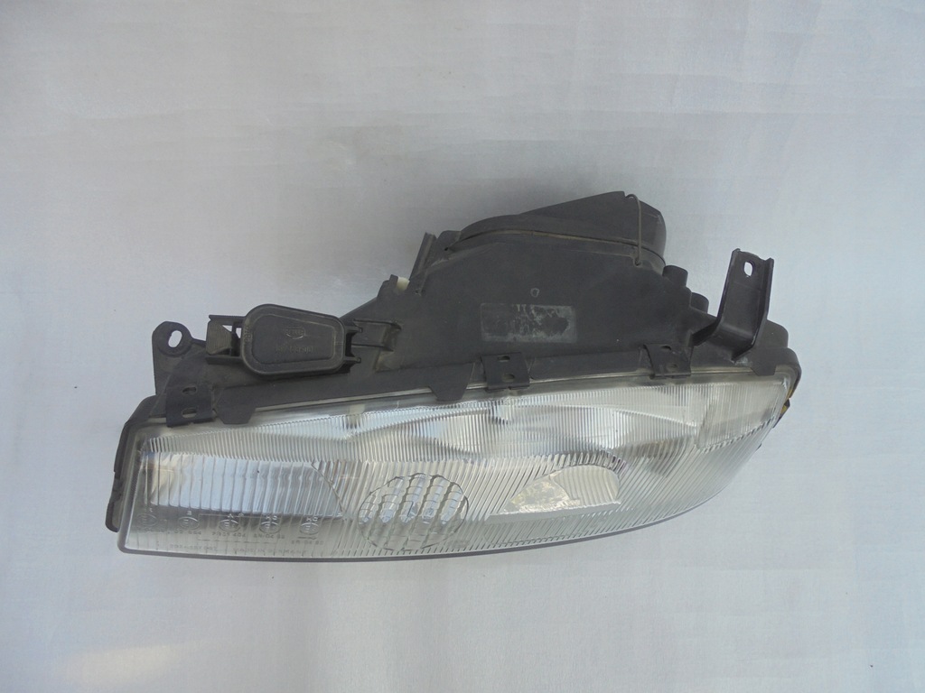 фото №11, Фара лампа левая правая opel calibra hella 1x линза ladne slask europ