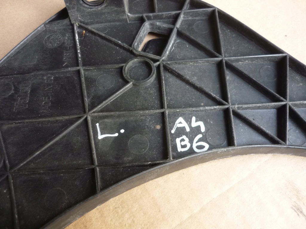 фото №12, Напрямна кронштейн лампи лівий перед audi a4 b6 valeo