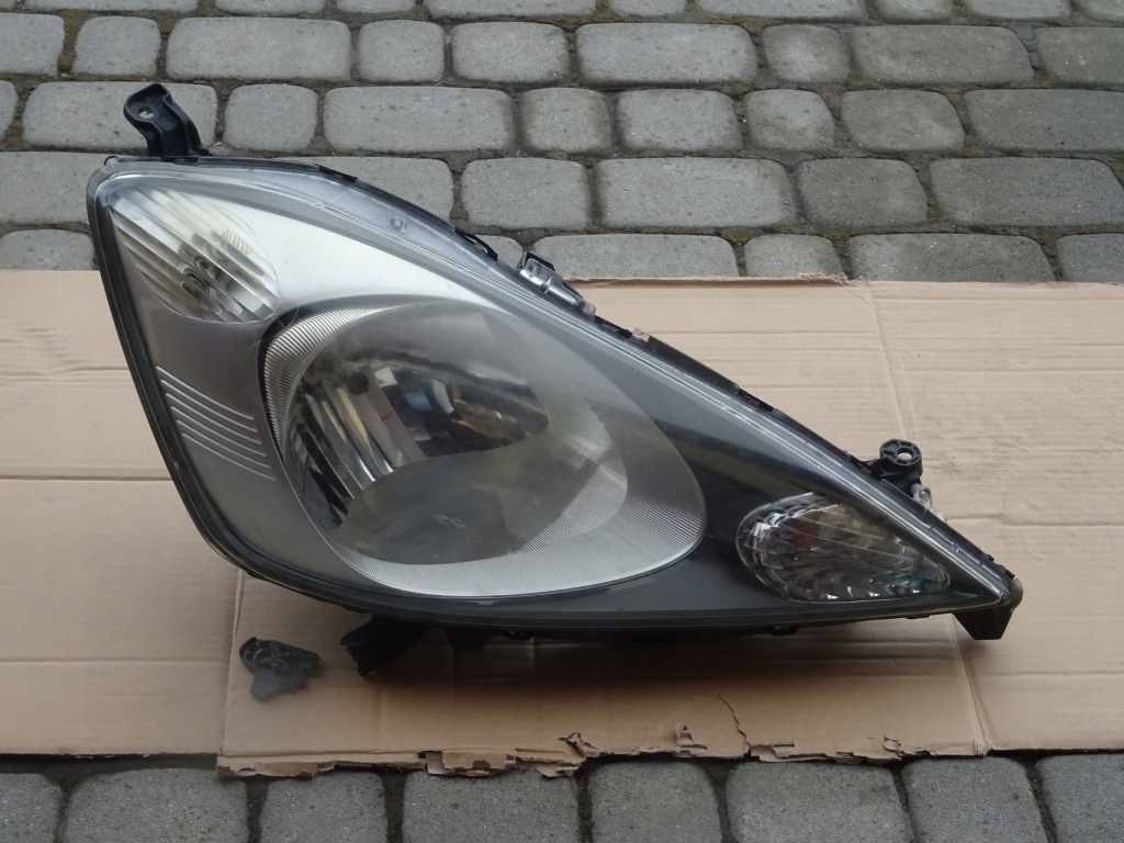 фото №1, Honda jazz iii лампа передня права оригінал