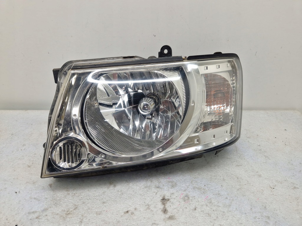фото №1, Nissan patrol y61 gu4 2004- фара лампа ліва eu