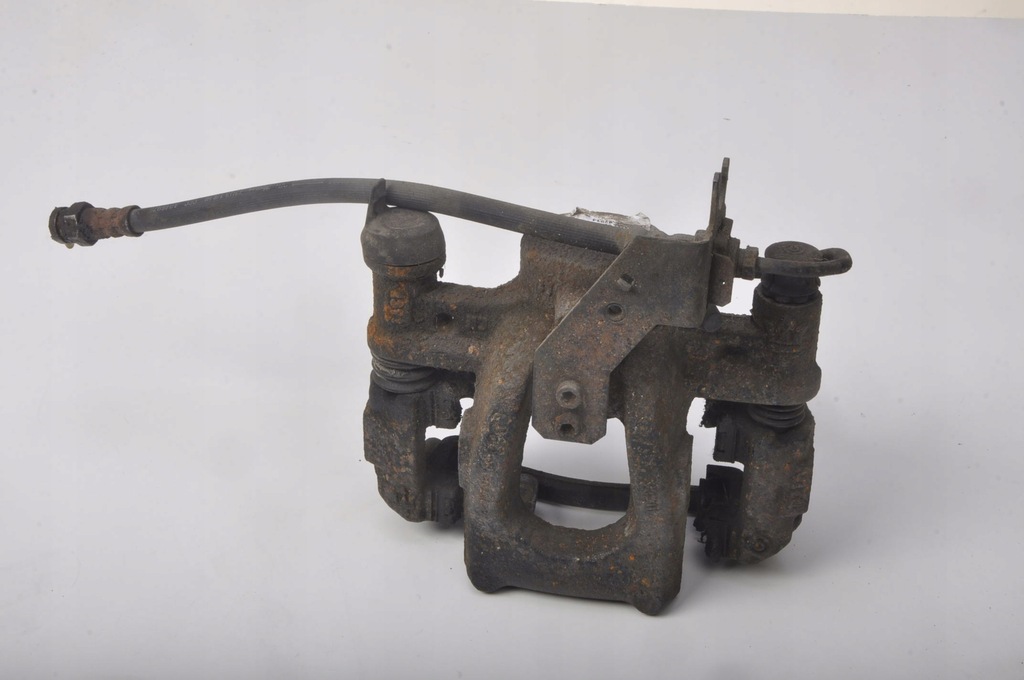 фото №1, Ghibli iii 3.0 d супорт гальмівний правий задня