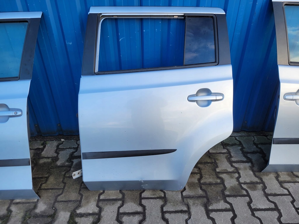 фото №1, Daihatsu materia дверь левая задние