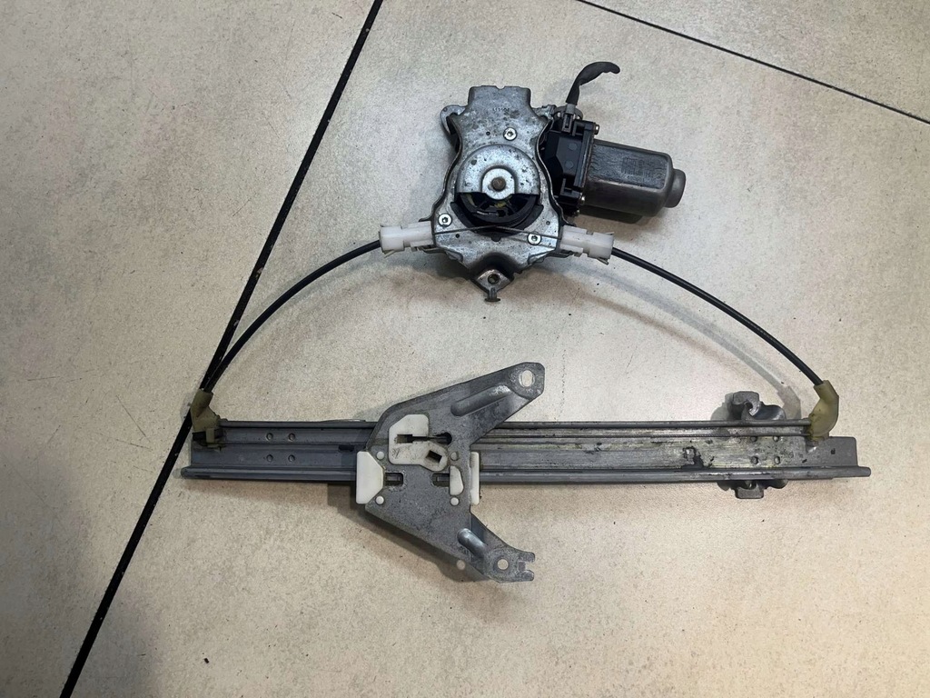 фото №6, Подъемник стекло левый задняя primera p12 1.9dci 400601