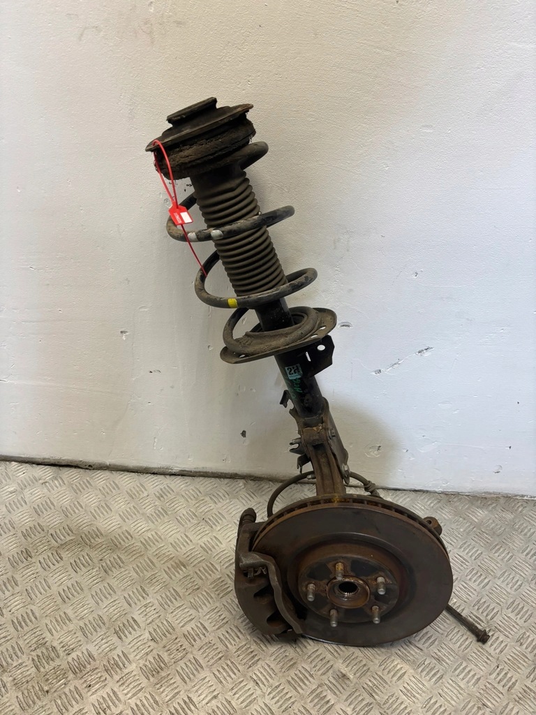 фото №1, Амортизатор поворотный кулак левый koleos i 1 2.0 dci