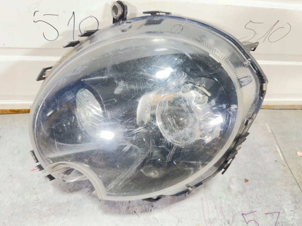 Mini r55 / r56 фара правий ксенон 100061-00 Оригінал