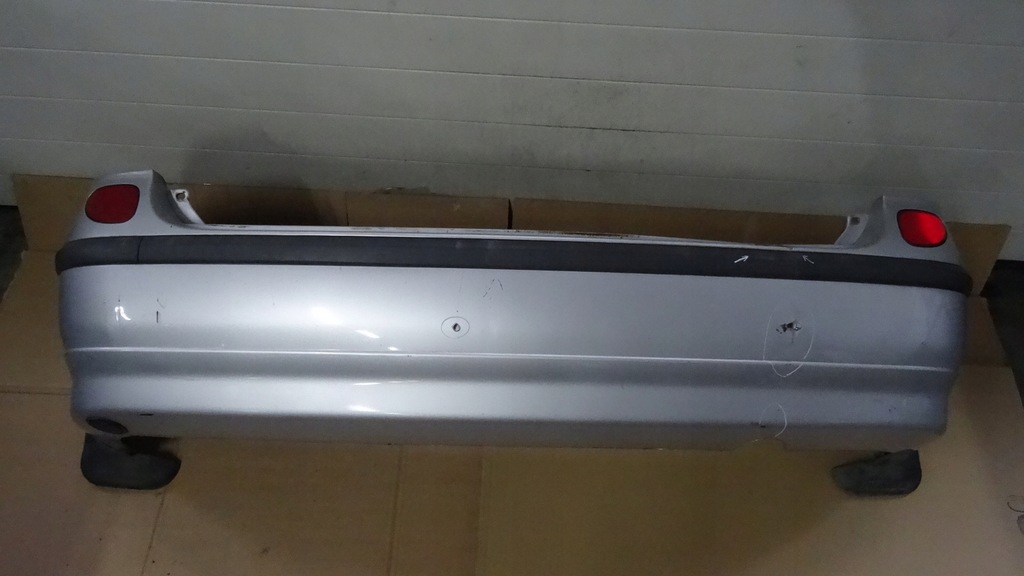 фото №1, Almera tino бампер задня