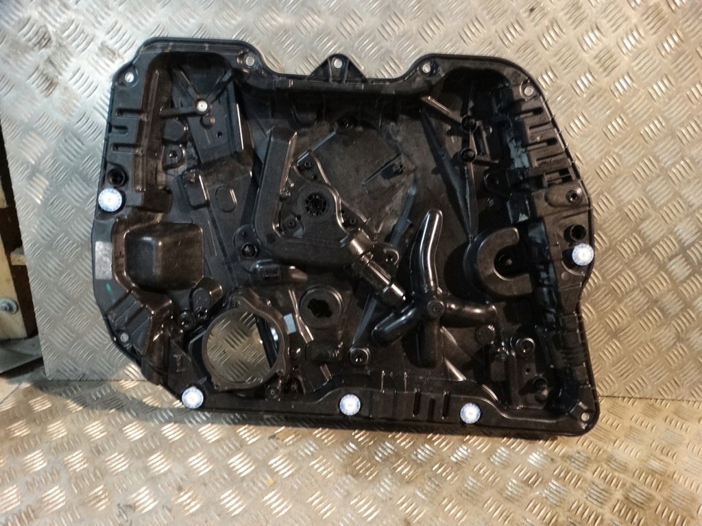 фото №1, Рамка підйомник скло двері лівий перед bmw g02 1