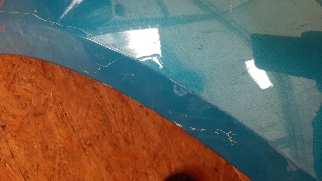 фото №11, Nissan navara d40 iii 2005- крыло левый перед оригинальный zdrowy