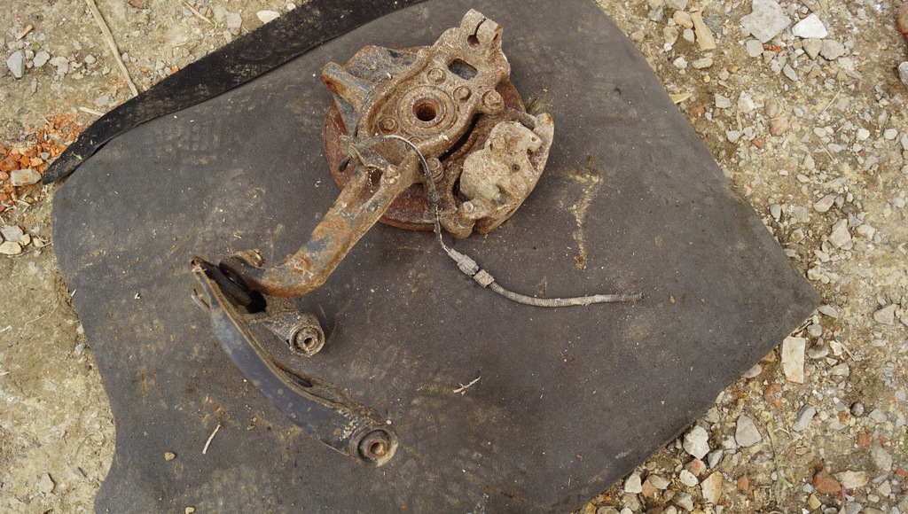 фото №8, Поворотный кулак левый перед nissan navara d40 3.0d