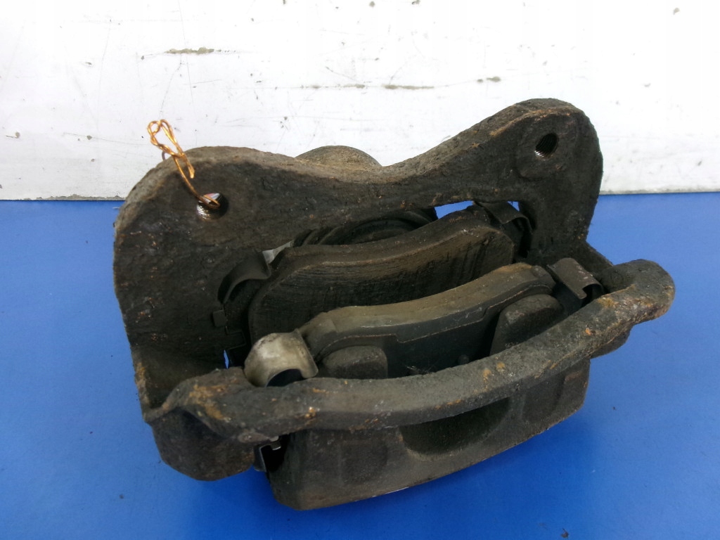 фото №1, Hyundai tucson jm 2.7 v6 суппорт скоба тормоза перед левый