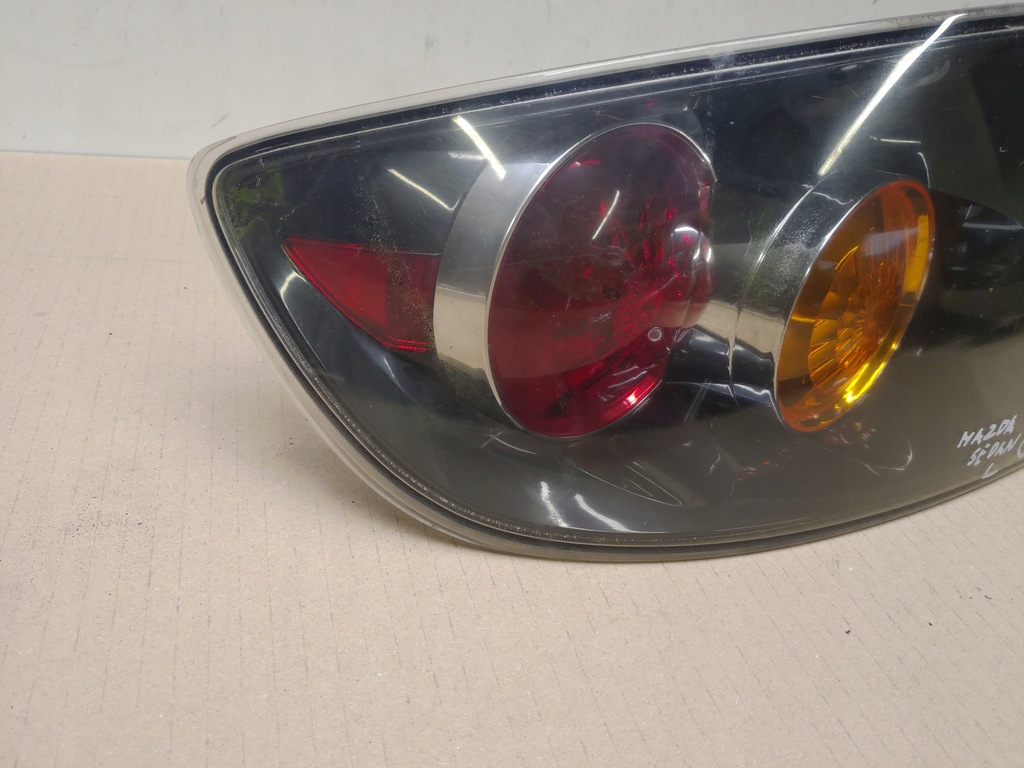 фото №7, Лампа ліва задня задня w крила mazda iii 3 bk sedan sport 2003-