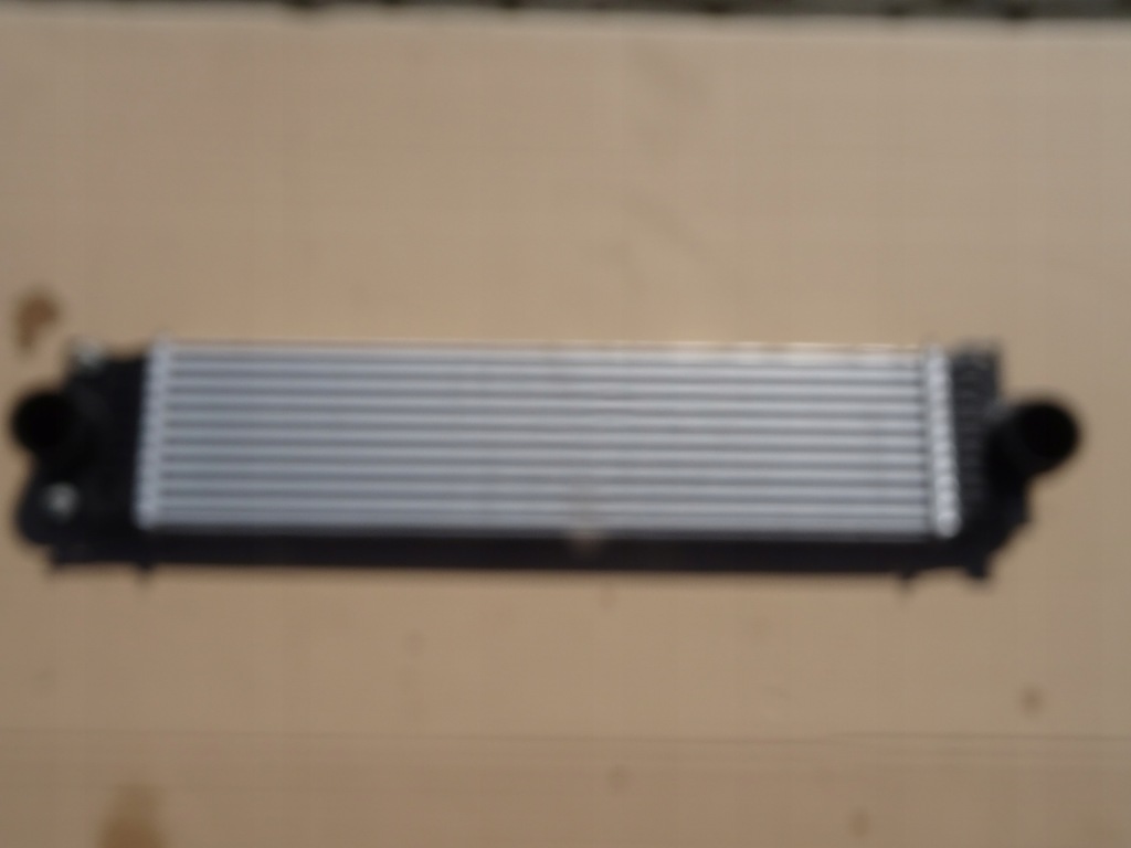 Купити Ford інтеркулер оригінал fp53-6k775-aa стан bdb