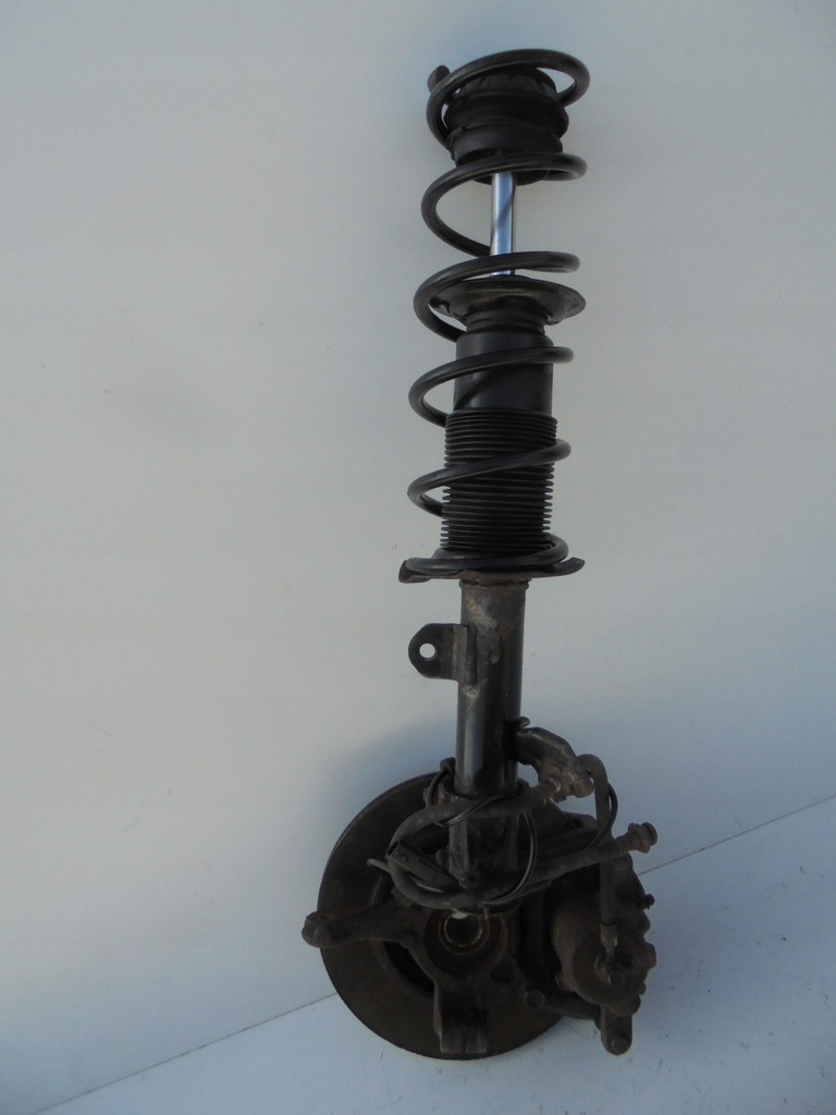 фото №8, Nissan note ii e12 амортизаторна стійка поворотний кулак ліва