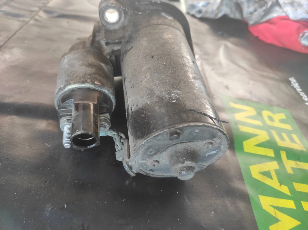 Стартер opel оригінальний номер 24436877 Недорого