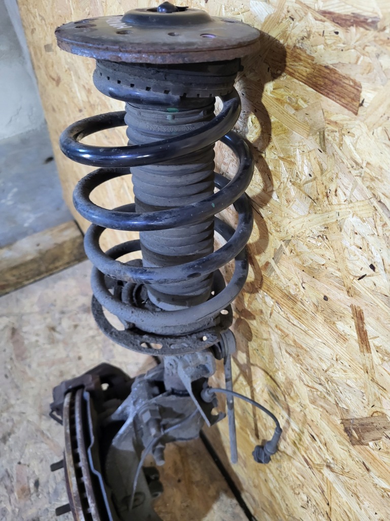 Амортизационная стойка поворотный кулак амортизатор левый перед ford mondeo mk5 2.0 hg9c-18k001 Недорого