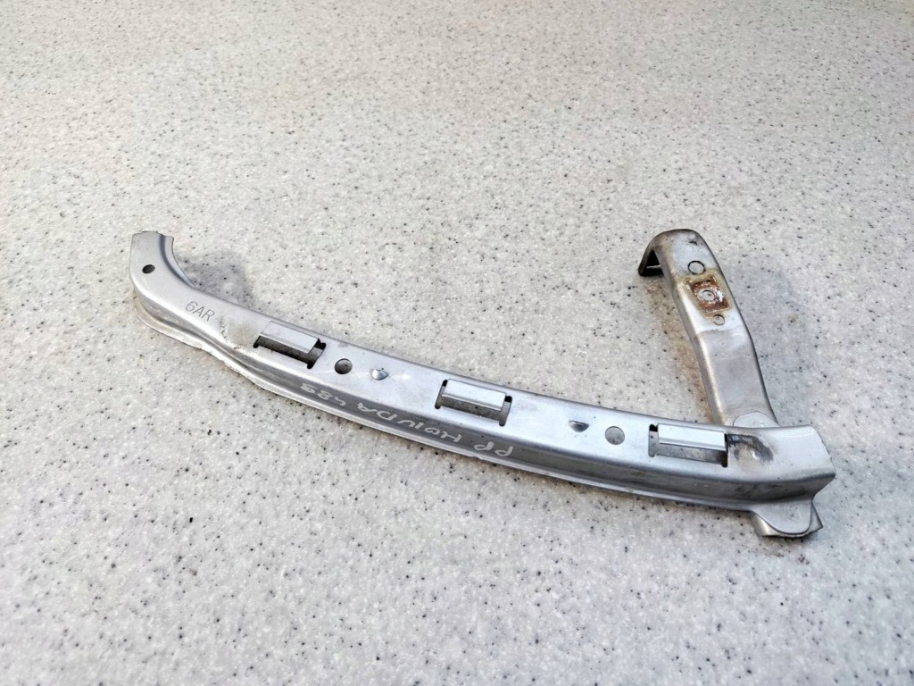 фото №1, Направляющая кронштейн лампы правый перед передняя civic vii 1.7 cdti