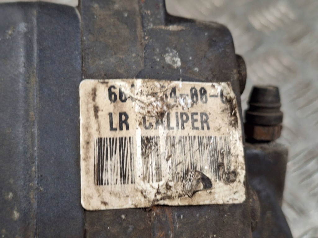 Суппорт тормозной задний задний  сторона левая tesla model s 600643400c Цена