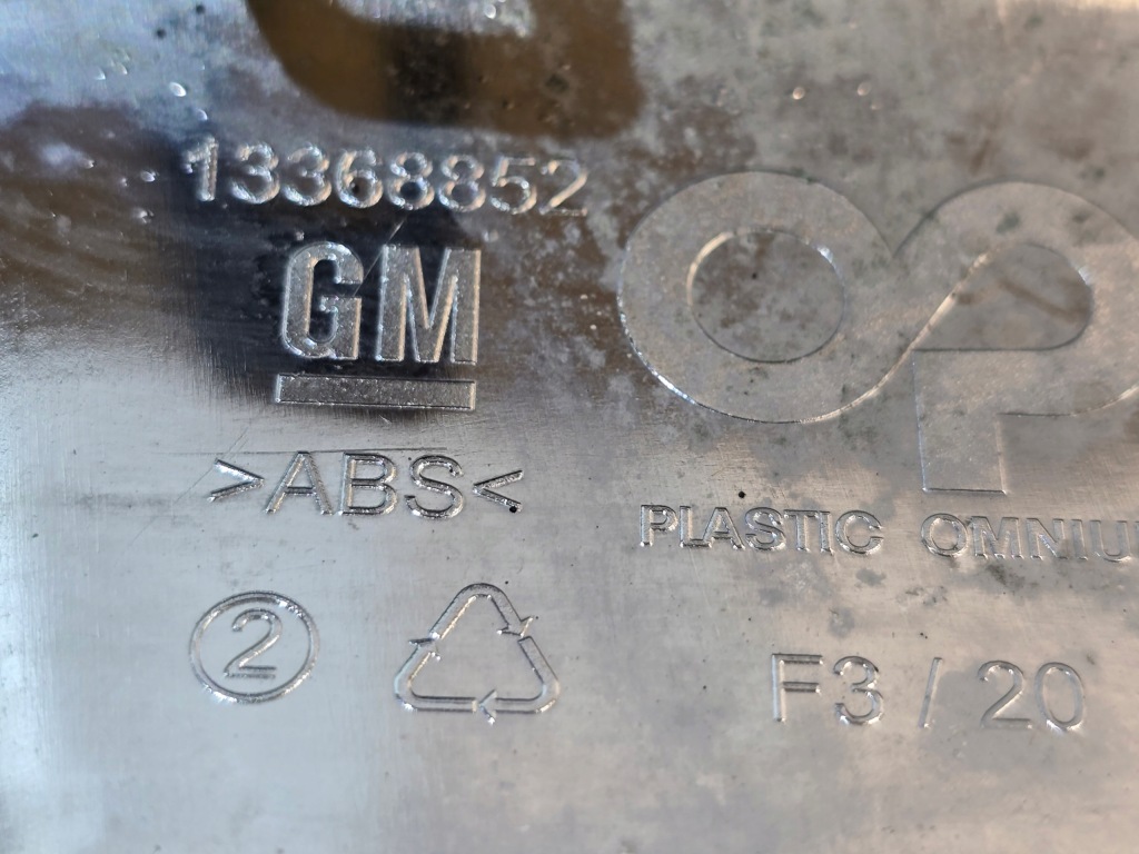 Opel astra j рестайлінг  молдинг хром решітка Зі Шроту