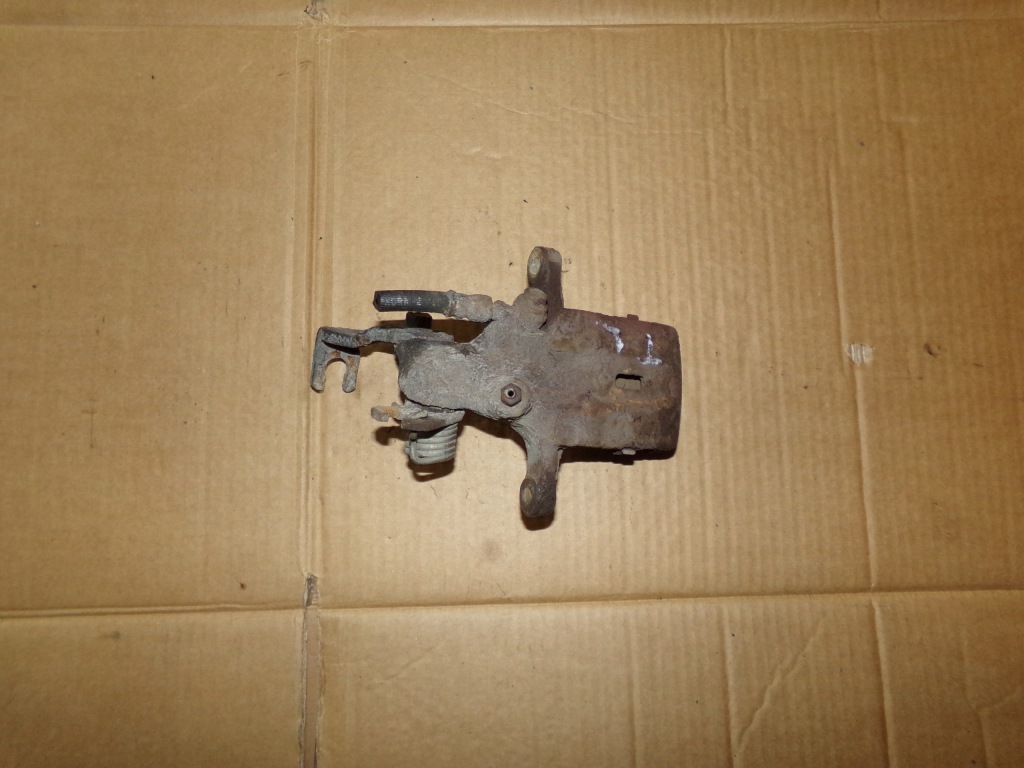 фото №1, Суппорт тормозной левый задняя задний almera n15 lift