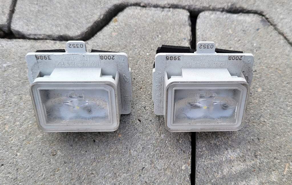 фото №1, Mercedes w213 лампа освітлення номерного знака