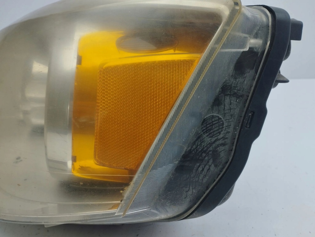 фото №9, Chrysler town & country v 2008 левая сторона лампа передняя