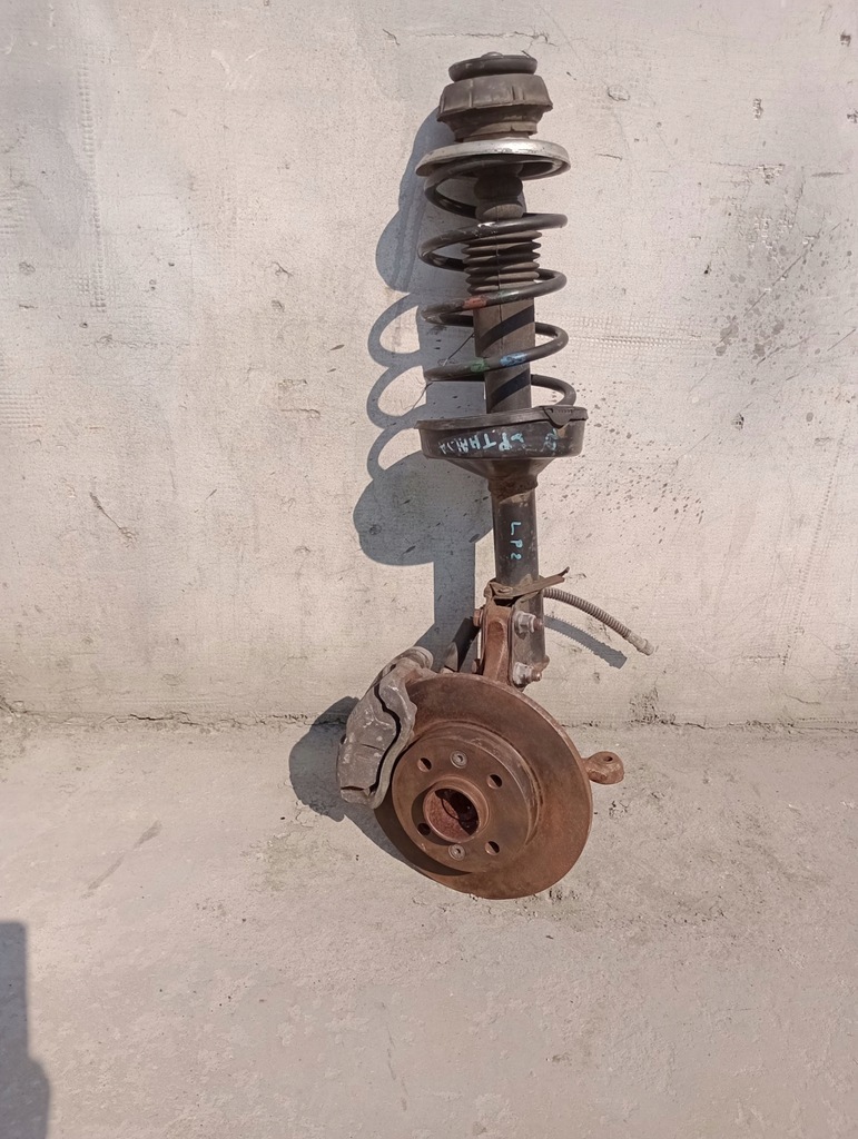 фото №1, Ліва поворотний кулак підвіска амортизаторна стійка ступиця renault thalia 1.2