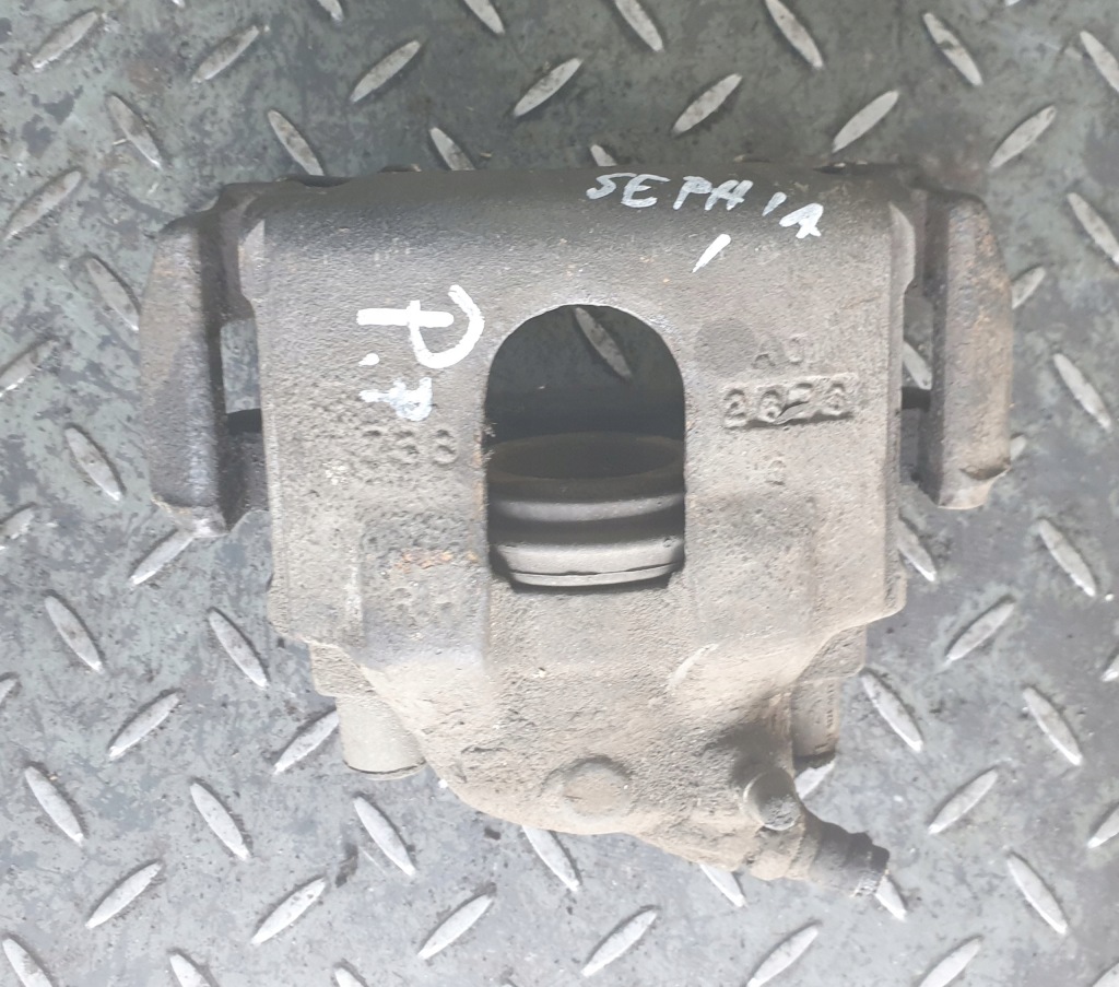 фото №1, Суппорт тормозной правый перед kia sephia i 1.5