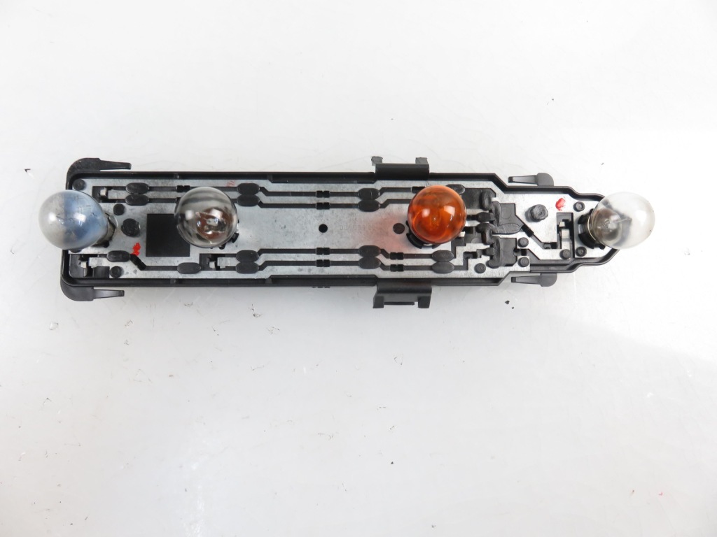 Купить Вкладыш лампы левый задний  mercedes s203 15355900